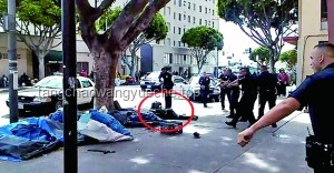 洛杉磯壯漢抗議者拳打警察事件解析