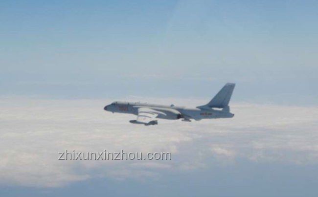 殲-15雨中驅(qū)離：藍(lán)海戰(zhàn)略下的空域創(chuàng)新守護(hù)